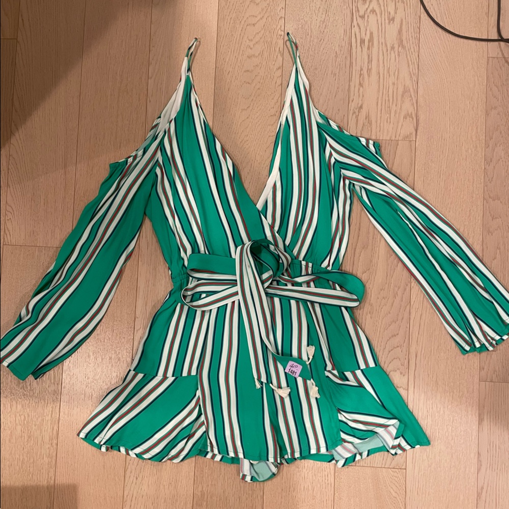 Line and Dot green striped romper with shoulder cut outs and tie belt